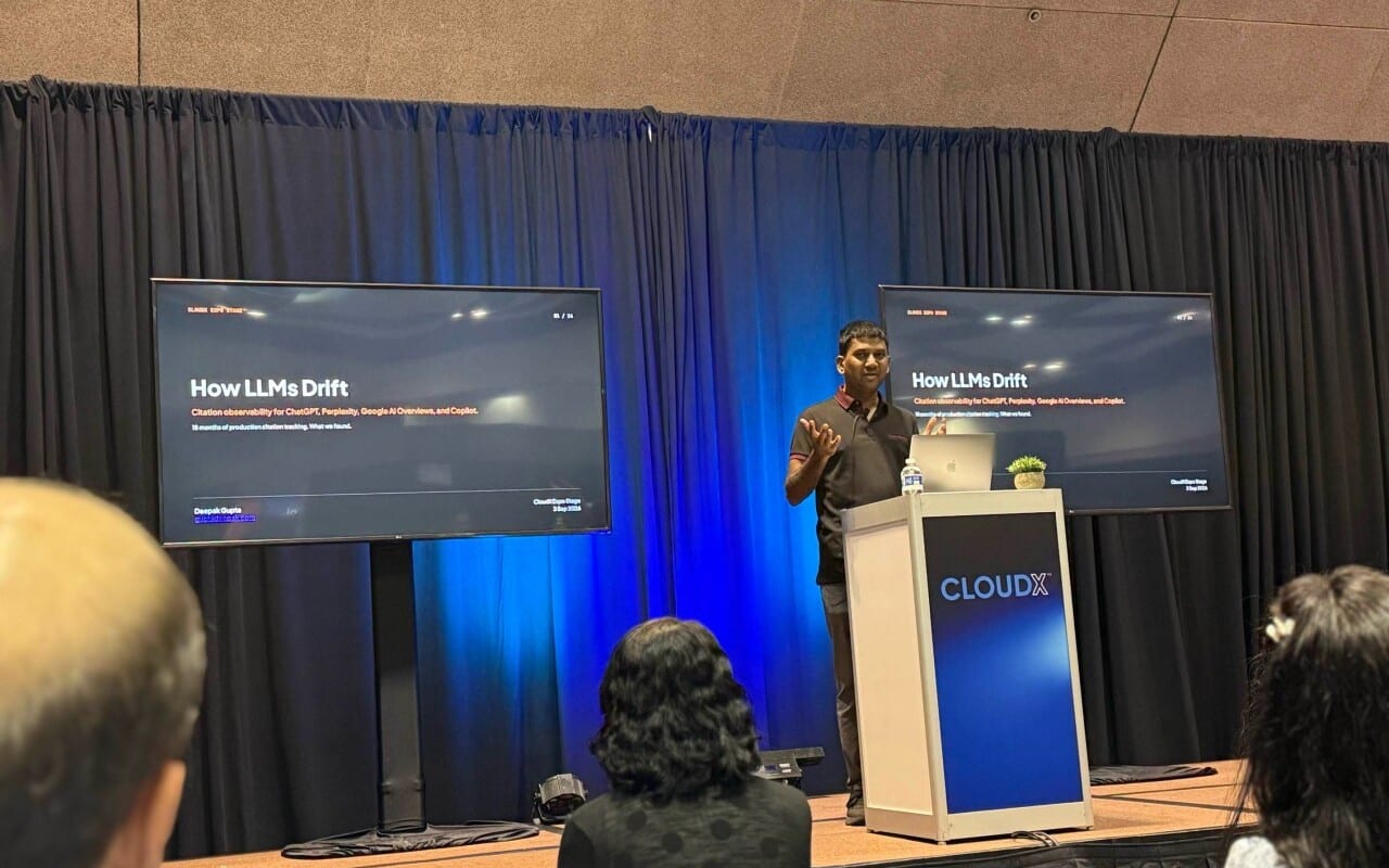 Deepak Gupta presenting How LLMs Drift on the CloudX Expo Stage at AI TechWorld 2026